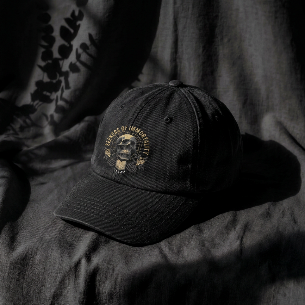 "Seekers" – Skull & Tome Gothic Flexfit Hat